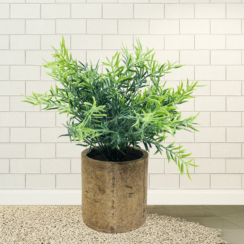 Planta artificial tipo erva em vaso rústico