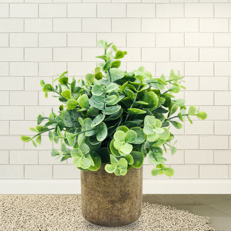 Planta artificial lisimáquia em vaso rústico